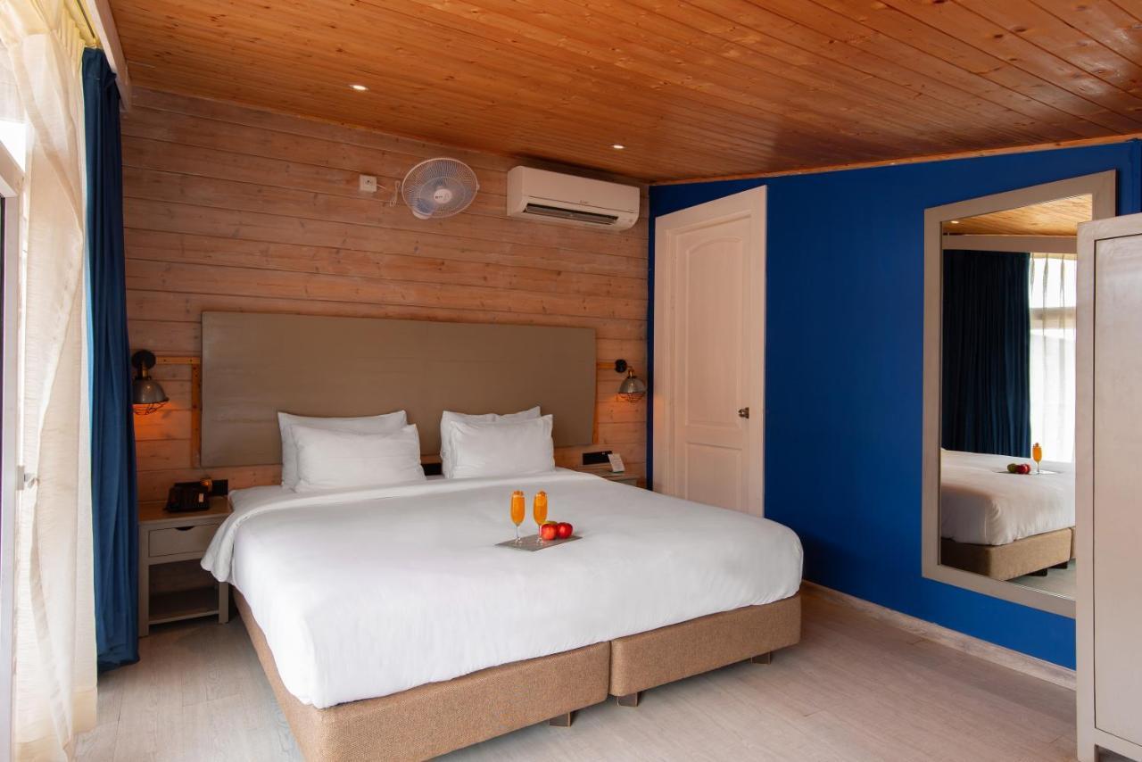 Living Room Beach Resort Морджим Экстерьер фото
